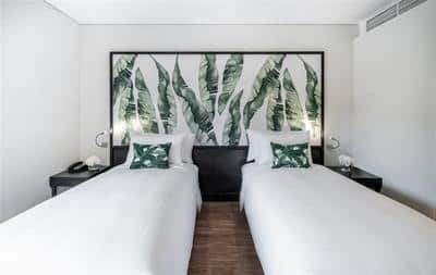 Twin beds in the Two Bedroom Suite