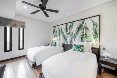 Twin beds in a Two Bedroom Suite bedroom