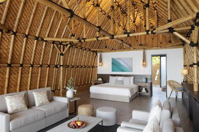 Living room with bed, sofas and coffee table