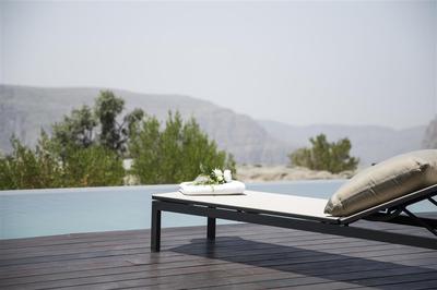 Sunbed in One Bedroom Cliff Pool Villa