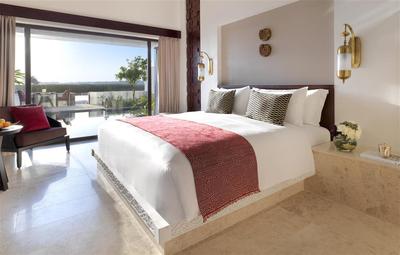Bedroom with view of the pool and lagoon