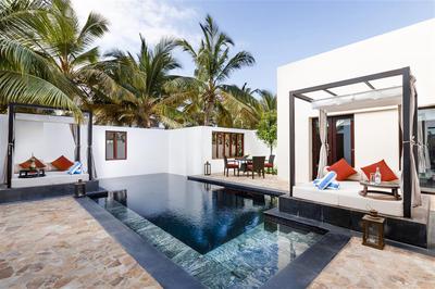 Two cabanas beside the pool