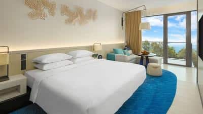 1 King Bed Partial Ocean View Family