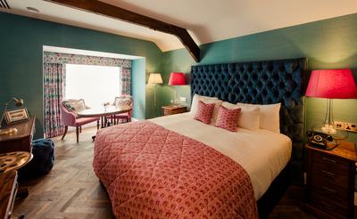The Coach House Fuchsia Bedroom