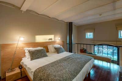 A Family Loft Suite Bedroom and the Seaside Garden