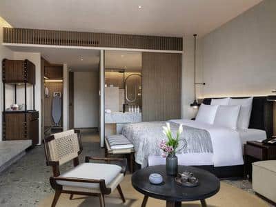 Deluxe Room, One King-size Bed, Private Balcony, and Garden Pool