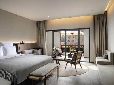 Deluxe Room, One King-size Bed, Private Balcony, and Garden Pool
