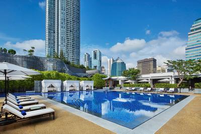 Outdoor Swimming Pool with Private Cabanas