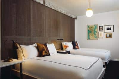 2 queen beds with pillow-top mattresses and Frette