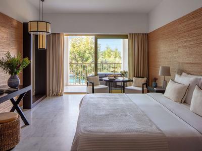 Deluxe Pool View Room with Balcony, King