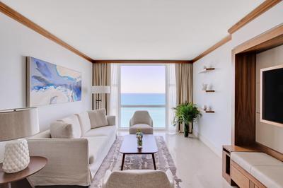 One King & Two Queen Beds with Balcony & Oceanfront View
