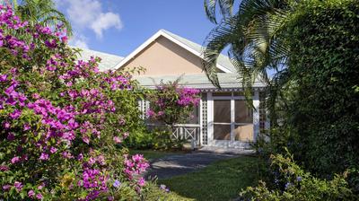 Two-Bedroom Palm Grove Residence with Pool