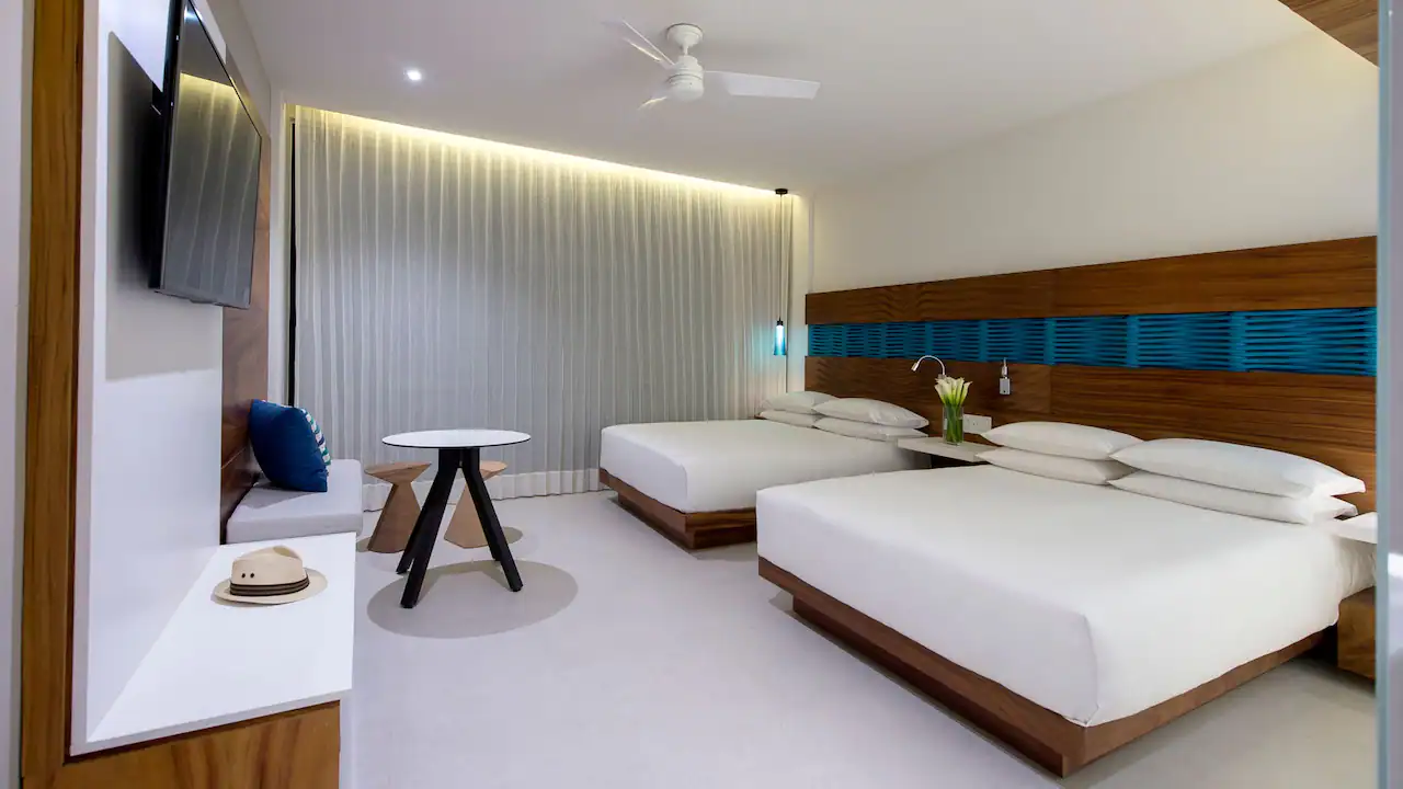 Swim Up with Two Queen Beds & Club Access