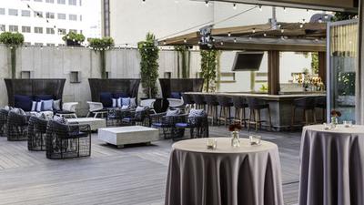 Outdoor Rooftop Pool Deck with Bar and Lounge