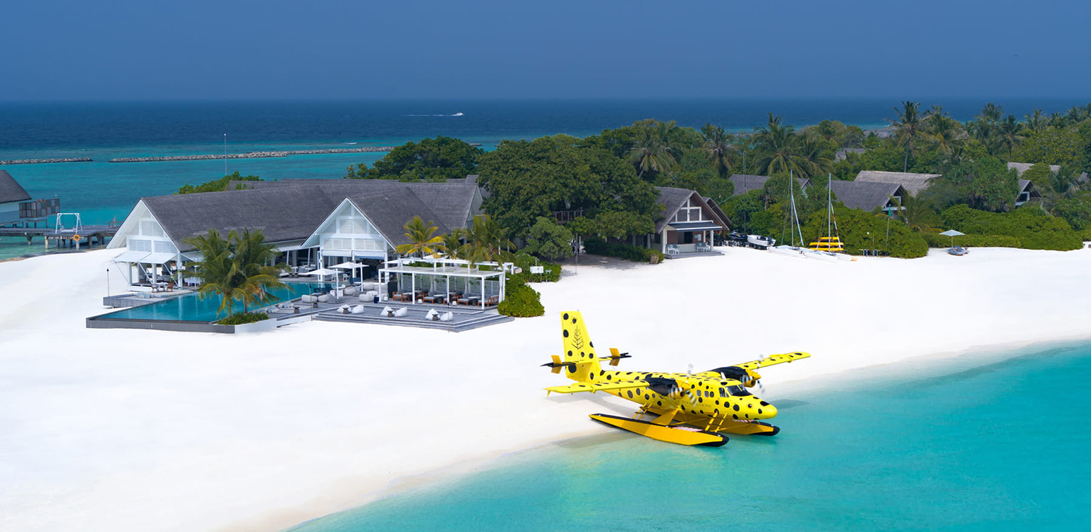 Yellow Seaplane at Four Seasons Landaa Giraavaru